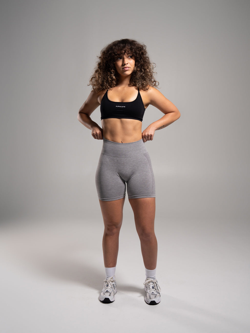 Velera Women's Pump Mid Rise Seamless Workout Shorts - Heather Grey women's workout shorts side view