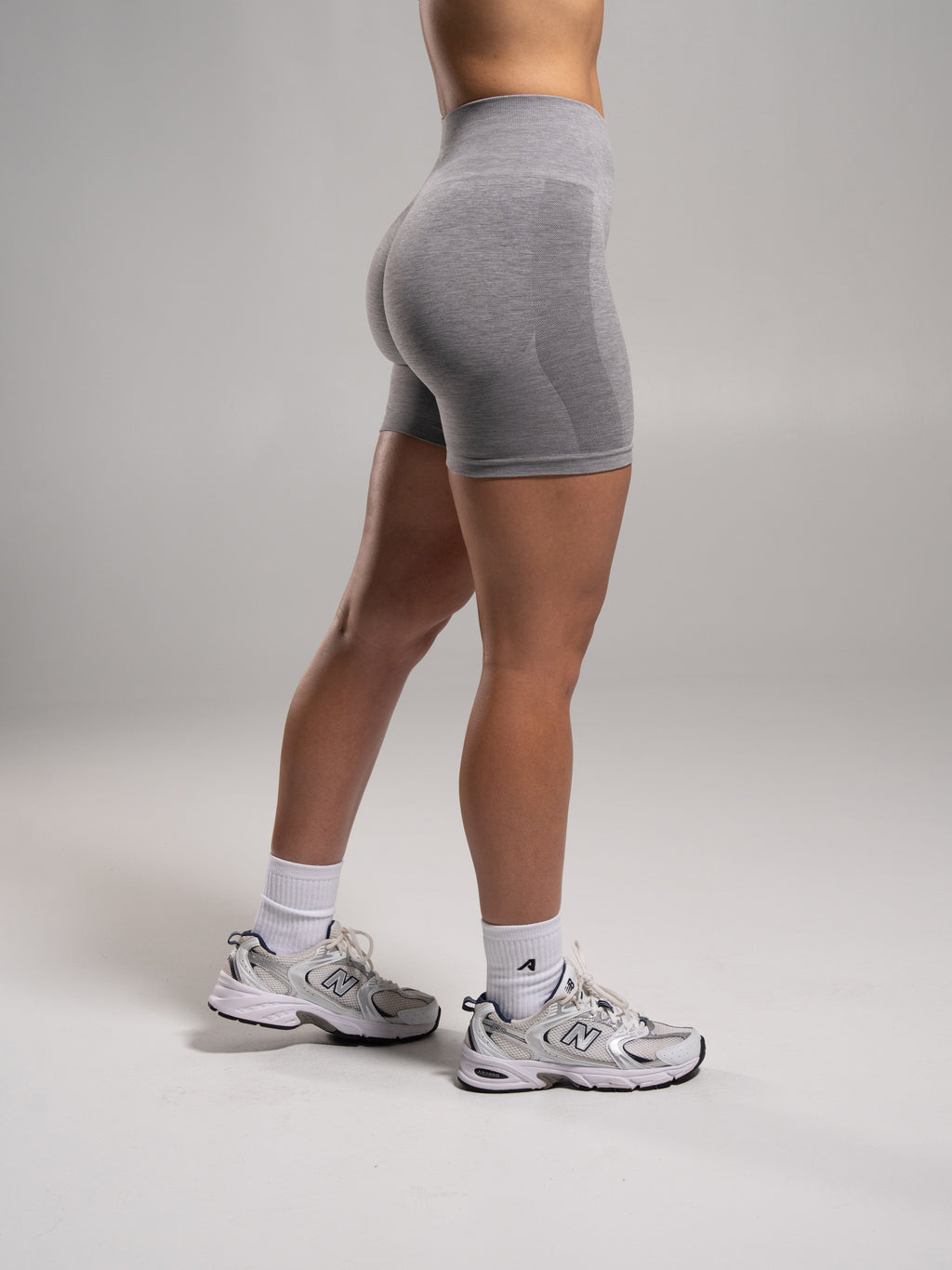 Velera Women's Pump Mid Rise Seamless Workout Shorts - Heather Grey women's workout shorts detail view