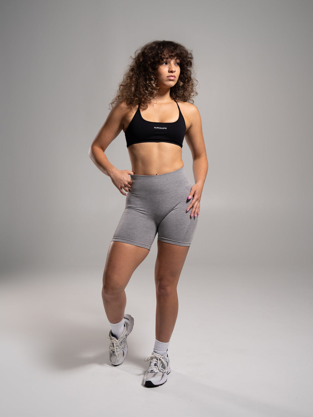 Velera Women's Pump Mid Rise Seamless Workout Shorts - Heather Grey women's workout shorts detail view
